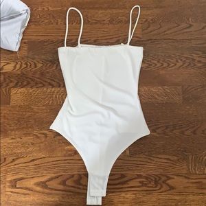 Cream colored bodysuit